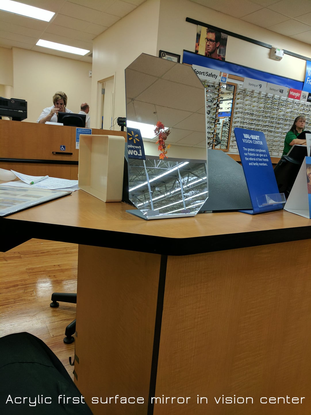Acrylic first surface mirror in vision center
